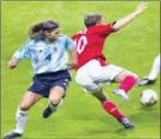  ?? AFP ?? England forward Michael Owen wins a penalty from Argentina defender Mauricio Pochettino at the 2002 World Cup.