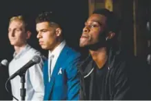  ?? AAron Ontiveroz, The Denver Post ?? Nuggets rookie Jarred Vanderbilt, right, listens to questions during an introducto­ry news conference June 22 at the Pepsi Center.