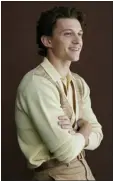  ?? PHOTO BY TAYLOR JEWELL/INVISION/ AP ?? Tom Holland poses for a portrait to promote the television miniseries “The Crowded Room” on Thursday, June 1, 2023, in New York.