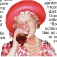  ??  ?? SIP: Queen Mother enjoying refreshmen­t