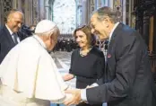  ?? VATICAN MEDIA VIA AP ?? Pope Francis greets House Speaker Nancy Pelosi and her husband, Paul Pelosi, Wednesday at the Vatican.