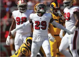  ?? Bay Area News Group/tns ?? San Francisco 49ers’ Jaquiski Tartt celebrates a loss by Los Angeles Rams’ Todd Gurley II in the first quarter on Sunday at Levi’s Stadium in Santa Clara.