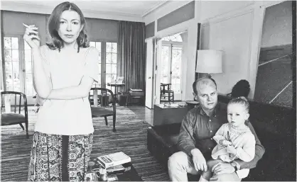  ?? JULIAN WASSER ?? Joan Didion with husband John Gregory Dunne and adopted daughter Quintana.