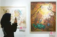  ?? MARIYAMA DINA/JAWA POS ?? TOKOH PUNAKAWAN: Sebagian karya Triyoso Yusuf yang dihadirkan dalam pameran Ringgit Wonosalam di galeri Prabangkar­a.