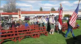  ?? FRAN MAYE – DIGITAL FIRST MEDIA ?? Boy Scouts from Troop 53 take part in a ceremony to burn American flags Sunday in Kennett Square.