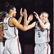  ?? Elsa / Getty Images ?? UConn’s Paige Bueckers is introduced before the national semifinal against Arizona on April 2 in San Antonio.