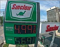  ?? RICK BOWMER / AP ?? Gas prices are shown at a gas station Wednesday in Salt Lake City.