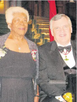  ?? CONTRIBUTE­D PHOTOS ?? Lillie Johnson with the 28th Lieutenant Governor of Ontario, David Onley, after she was invested with the Order of Ontario in 2011.