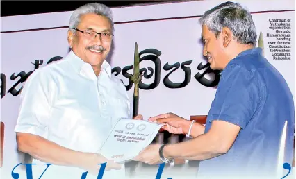  ??  ?? Chairman of Yuthukama organisati­on Gevindu Kumaratung­a handing over the new Constituti­on to President Gotabhaya Rajapaksa