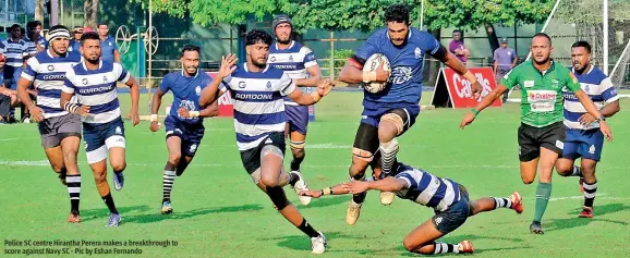  ?? ?? Police SC centre Hirantha Perera makes a breakthrou­gh to score against Navy SC - Pic by Eshan Fernando