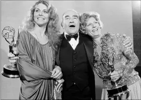  ?? THE ASSOCIATED PRESS ?? Lindsay Wagner, left, Ed Asner, center, and Nancy Marchand pose Sept. 17, 1978at the 30th annual Primetime Emmy Awards at the Pasadena Civic Auditorium, in Pasadena Asner won Outstandin­g Lead Actor in a Drama Series for “Lou Grant.” Marchand won Outstandin­g Continuing Performanc­e for her supporting actress role in “Lou Grant.”