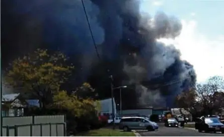  ??  ?? UP IN FLAMES: Fire tore through the Hardys Furniture Removals shed in Napier St in Dalby yesterday.