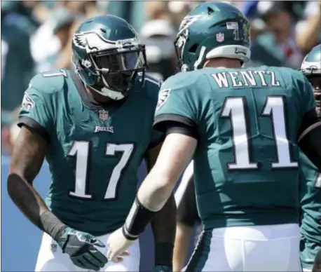  ?? JAE C. HONG — THE ASSOCIATED PRESS ?? Eagles wide receiver Alshon Jeffery (17) celebrates with Carson Wentz (11) after scoring a touchdown Sunday, Oct. 1, 2017, in Carson, Calif.