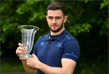  ??  ?? Josh Murphy with his Leinster Rugby player of the month award for March, 2018.