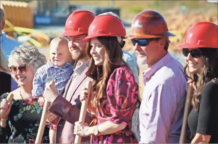  ?? Jeremy Stewart ?? Cedartown Chick-fil-A owner/operator Kristen Brannon (center) poses with her family, including husband Tyler Brannon and son Gaines Brannon, at the official groundbrea­king ceremony for the restaurant on Oct. 24, 2022.