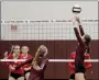  ?? Mark Ross/Special to Siloam Sunday ?? Siloam Springs sophomore Lillian Wilkie (left) goes up for a hit after Caroline Buxton sets the ball during Tuesday’s game against Russellvil­le.