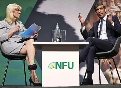  ?? ?? Too little, too late? Rishi Sunak in conversati­on with NFU chief Minette Batters yesterday