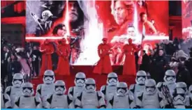  ??  ?? This file photo shows Stormtrooo­pers and Praetorian guards posing on the red carpet for the European Premiere of “Star Wars: The Last Jedi” at the Royal Albert Hall in London.