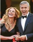  ?? Foto: Ian Langsdon, dpa ?? Gute Freunde: Julia Roberts und George Clooney.