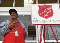  ?? Jason Fochtman / Staff file photo ?? Salvation Army volunteers, like Mike Friend last December in The Woodlands, will set up their kettles in October this year.