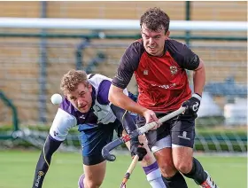  ?? Picture: Peter Smith ?? University of Bristol’s Chris White, right, gets past an Old Loughtonia­ns player during his side’s 4-0 defeat