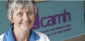  ?? SALVATORE SACCO FOR THE TORONTO STAR ?? Virginia Wilson says rTMS treatment has healed her almost completely. She now works as a technician at CAMH, where she helps to test schizophre­nia drugs.