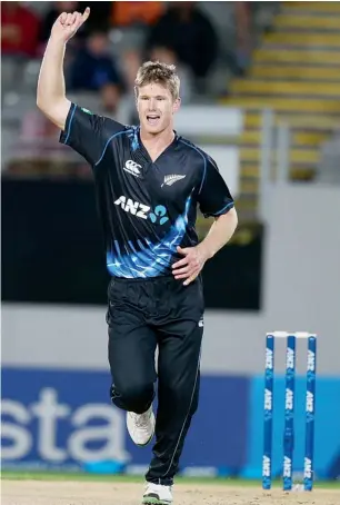  ??  ?? New Zealand’s Jimmy Neesham celebrates after taking a wicket during the Twenty20 internatio­nal match against the West Indies at Eden Park in Auckland.