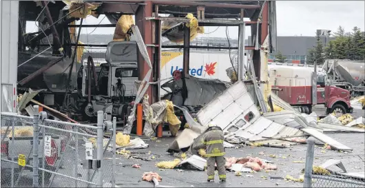  ?? JOE GIBBONS/THE TELEGRAM ?? Trimac National Tank Services on Kyle Avenue in the Donovans Business Park was heavily damaged following an explosion in the facility around 8:20 a.m. on Tuesday.