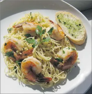  ?? — MCT ?? One of the best aspects of shrimp scampi is that it’s ready in less than 45 minutes, start to finish.