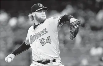  ?? RICH SCHULTZ/GETTY IMAGES ?? Orioles right-hander Andrew Cashner, who signed as a free agent in February, made his second start for his new team, pitching six innings and giving up only two hits and one earned run. He struck out five.