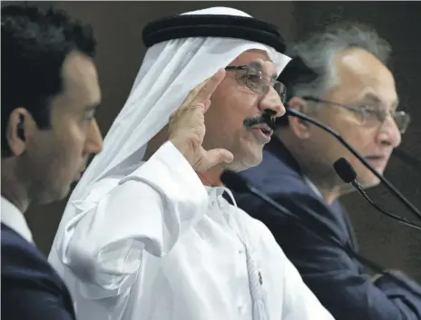  ?? AP ?? Sultan bin Sulayem, centre, the group chairman and CEO of port operator DP World at a news conference in Dubai yesterday