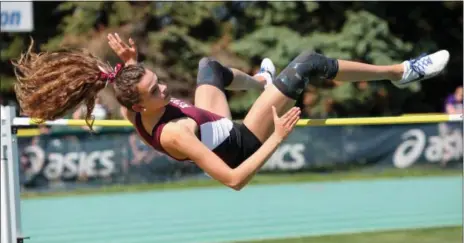  ?? RANDY MEYERS — THE MORNING JOURNAL ?? Rocky River’s Ava Rauser clears the bar in her first attempt in the high jump at the Division I Amherst regional on May 23. Rauser would clear 5-foot4to place third and qualify for state.