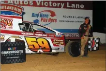  ?? RICH KEPNER - FOR MEDIANEWS GROUP ?? Dakota Kohler poses in victory lane after his first career Sportsman win at Big Diamond on July 19.