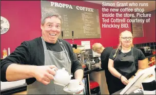  ??  ?? Simon Grant who runs the new coffee shop inside the store. Picture Ted Cottrell courtesy of Hinckley BID.