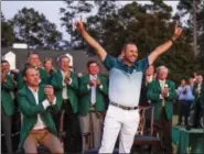  ?? CHRIS CARLSON — THE ASSOCIATED PRESS ?? Sergio Garcia, of Spain, celebrates at the green jacket ceremony after the Masters golf tournament Sunday in Augusta, Ga.