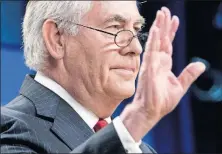  ?? [ANDREW HARNIK/THE ASSOCIATED PRESS] ?? Secretary of State Rex Tillerson waves goodbye after speaking at a news conference Tuesday at the State Department.