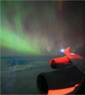  ??  ?? On a wing and a prayer: joyflights from Melbourne to Antarctica offer a privileged view of the Southern Lights in all their supernatur­al glory.