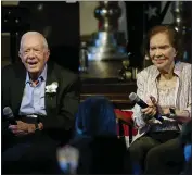  ?? JOHN BAZEMORE — THE ASSOCIATED PRESS FILE ?? Former President Jimmy Carter and his wife former first lady Rosalynn Carter sit together during a reception to celebrate their 75th wedding anniversar­y on July 10, 2021, in Plains, Ga.