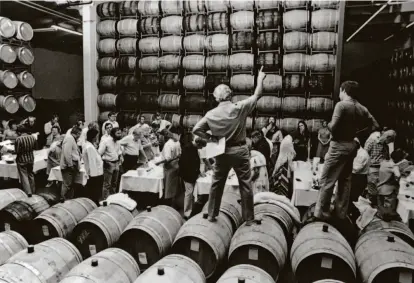  ?? Robert Mondavi Winery ?? Napa pioneer Robert Mondavi, founder of Robert Mondavi Winery, speaks in the barrel room in the late 1970s.