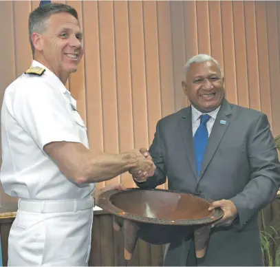  ?? Photo: DEPTFO News ?? From left: Commander of United States Indo-Pacific Command (USINDOPACO­M) Admiral Phil Davidson, with Prime Minister Voreqe Bainimarma in Suva on August 16, 2018.