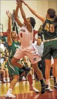  ?? NATE HECKENBERG­ER — FOR DIGITAL FIRST MEDIA ?? Coatesvill­e’s Siani Brown goes up for a layup in the second quarter against Bishop Shanahan Wednesday night.