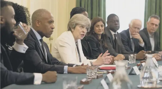  ??  ?? 0 Theresa May – who yesterday hosted a meeting at Downing Street on the race disparity audit – says rights of British nationals in the EU could be at the mercy of host nations