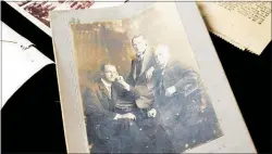  ?? PHOTO / BEVAN CONLEY ?? A photograph taken by renowned Whanganui photograph­er Frank Denton of John Brodie (right) with his son’s Archibald (left) and Henry (middle) in 1918.