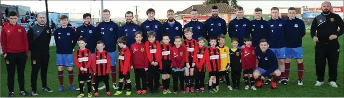  ??  ?? Laytown United Under-8s pictured with Drogheda United squad members before playing at half-time in the game against Shamrock Rovers.