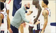  ?? David Butler II / USA Today ?? Connecticu­t Huskies head coach Dan Hurley reacts as his players come off the court in the first half against the Hartford Hawks at Harry A. Gampel Pavilion at UConn in Storrs on Nov. 27.