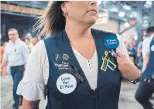  ?? PAUL RATJE AFP/GETTY IMAGES ?? The shooting at a Walmart in El Paso, Texas, this month that killed 22 sparked new calls from some corporate employees and gun-control activists for the chain to stop selling firearms.