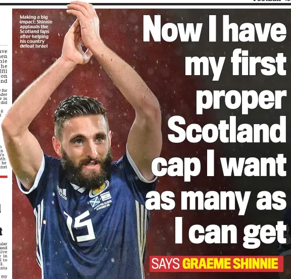  ??  ?? Making a big impact: Shinnie applauds the Scotland fans after helping his country defeat Israel