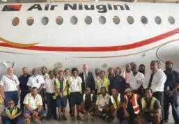  ??  ?? Checklist completed … Air Niugini managing director Alan Milne (centre) with members of the airline’s engineerin­g team responsibl­e for the heavy maintenanc­e check on P2 ANR.