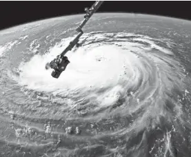  ?? NASA/GETTY IMAGES ?? The Internatio­nal Space Station views Hurricane Florence in the Atlantic Ocean on Sept. 10, 2018. The storm killed 53 people.