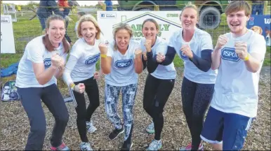  ??  ?? Canterbury RSPCA team the Kitty Cat Climbers prepare to take on the annual KM Charity Assault Course Challenge at Betteshang­er Country Park, near Deal